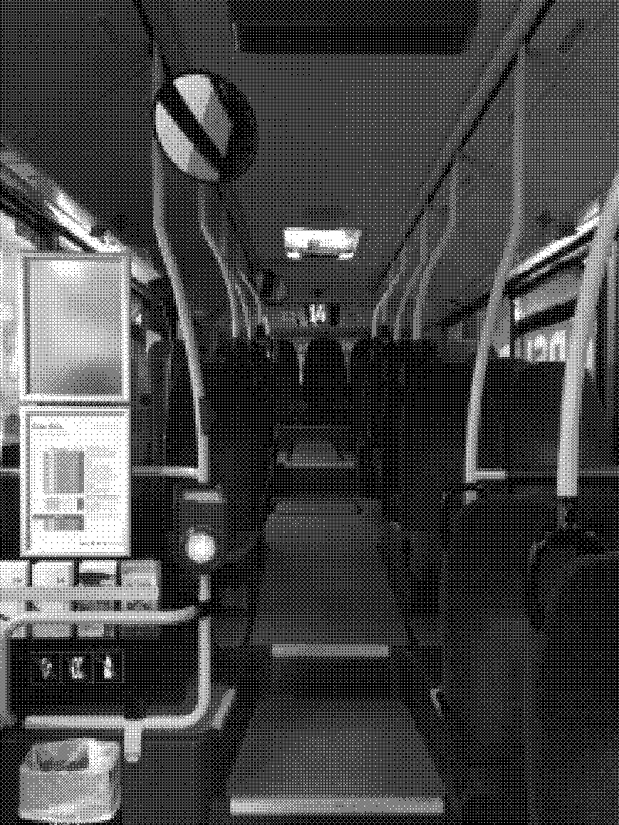 Black and white image of the inside of a bus