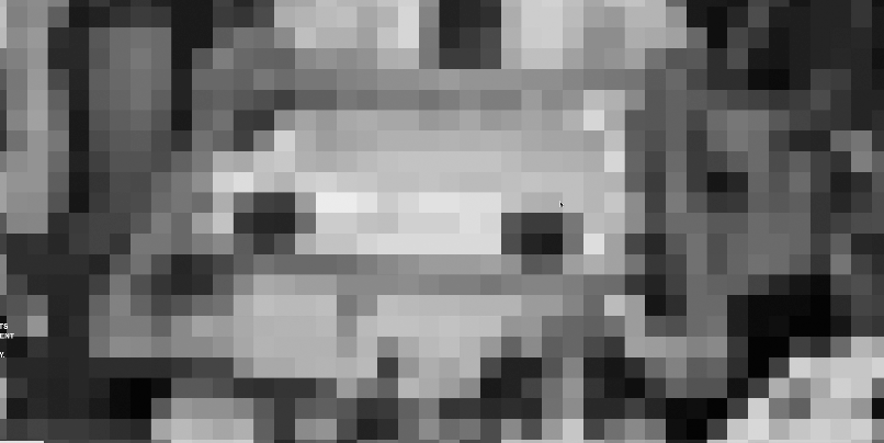 black and white image of pixels forming an abstract unrecognisable shape