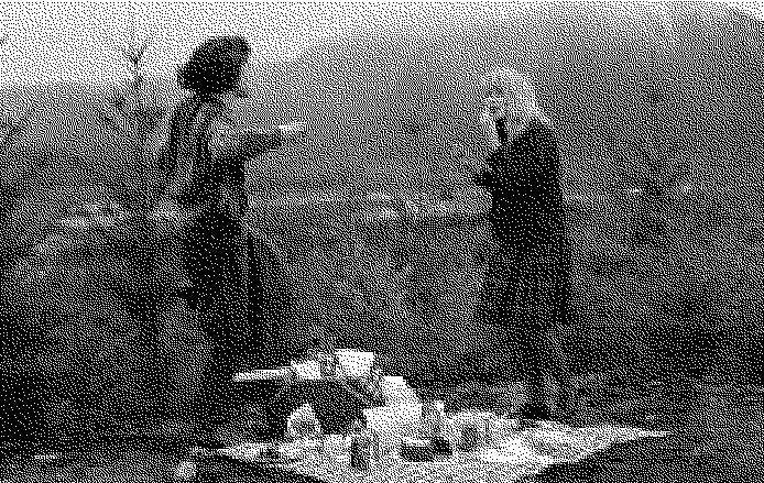 black and white pixelated screenshot from Twin Peaks, two women dance on a hill while having a picnic